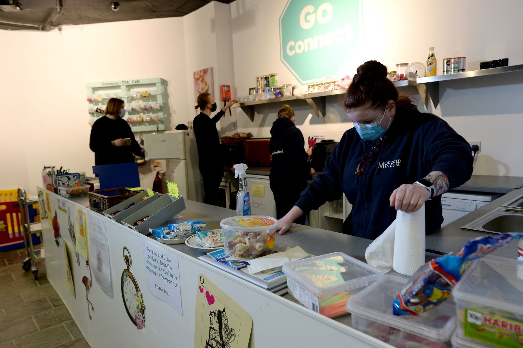 Volunteers in the cafes at the Happy Hub